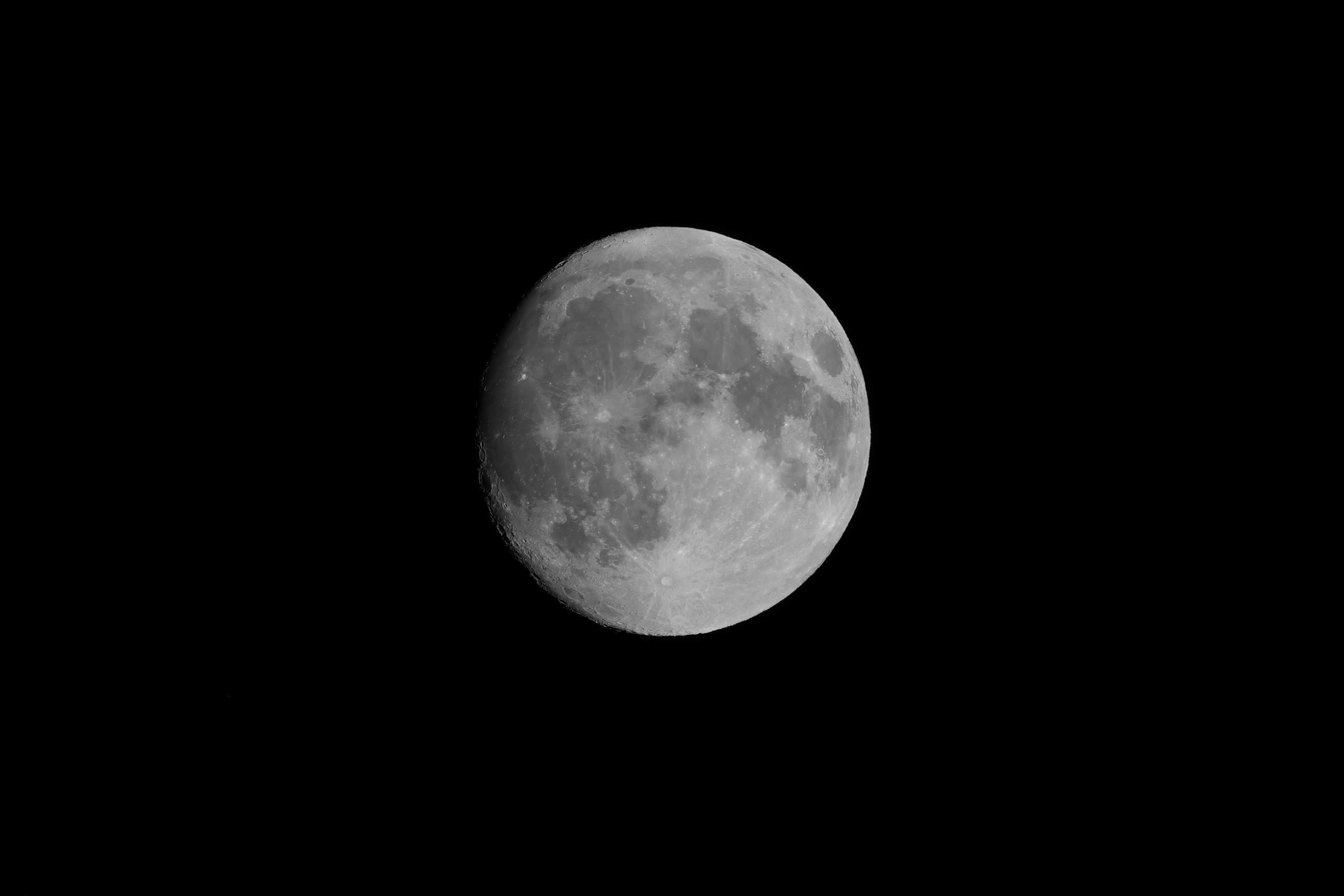 I shot this photo of the Waxing Gibbous Sturgeon Moon, 96.1% full, 8:51 PM Pacific Time, 25 August 2026, Oregon. One shot, no crop! Aperture f/11, SS 1/250 second, ISO-400, AWB 5150 Kelvin, Fujifilm X-H2s camera body, Fujifilm XF 150-600 mm f/5.6-8 R LM OIS WR Lens at 600 mm with 1.4x teleconverter. Fujifilm Acros film simulation. Copyright Steve J Davis. All Rights Reserved.